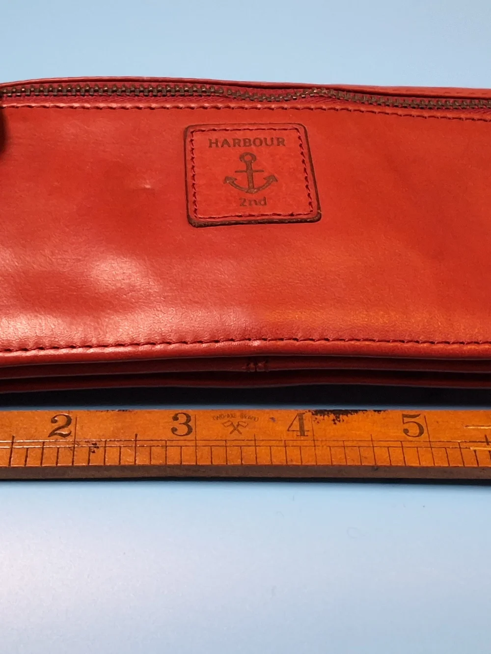 Sag Harbor Red Leather Clutch Wallet with Metal Logo